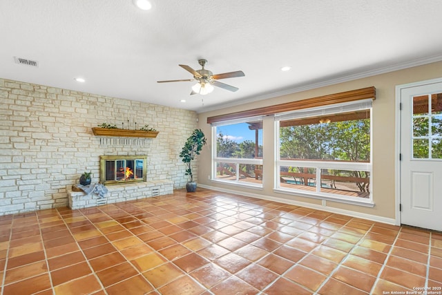 890 Live Oak, Spring Branch, TX 78070 - unfurnished living room featuring ceiling fan, tile patterned flooring, recessed lighting, a fireplace, and ornamental molding