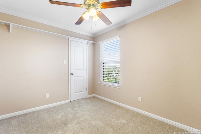 890 Live Oak, Spring Branch, TX 78070 - empty room featuring light colored carpet, baseboards, ceiling fan, and crown molding