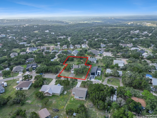 890 Live Oak, Spring Branch, TX 78070 - aerial overview of property's location with property parcel outlined and nearby suburban area