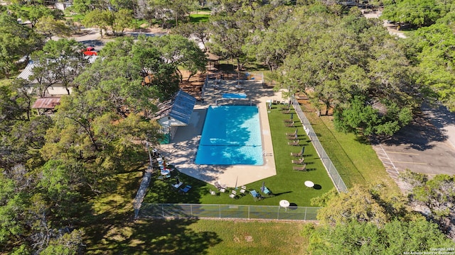 890 Live Oak, Spring Branch, TX 78070 - aerial view of a pool area and a tree filled landscape
