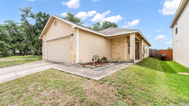 3714 Hideaway Grn, San Antonio, TX 78261 - view of front facade with stone siding, a garage, and driveway