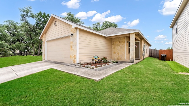 3714 Hideaway Grn, San Antonio, TX 78261 - view of front of home featuring stone siding, a garage, and driveway