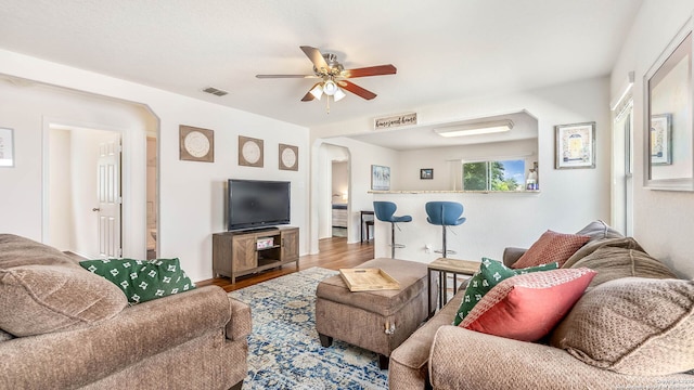 3714 Hideaway Grn, San Antonio, TX 78261 - living room featuring wood finished floors, arched walkways, and ceiling fan