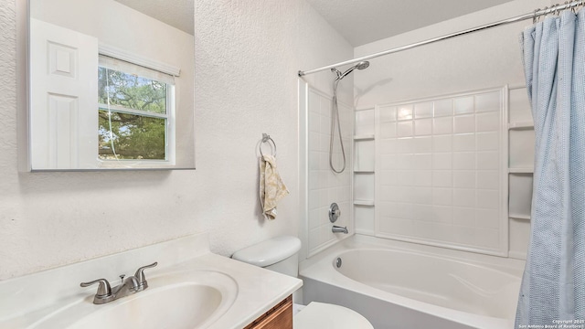 3714 Hideaway Grn, San Antonio, TX 78261 - full bathroom featuring toilet, shower / bathtub combination with curtain, a textured wall, and vanity