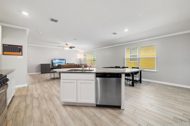 810 Brown Thrasher, San Antonio, TX 78253 - kitchen featuring appliances with stainless steel finishes, ornamental molding, a sink, open floor plan, and light wood finished floors