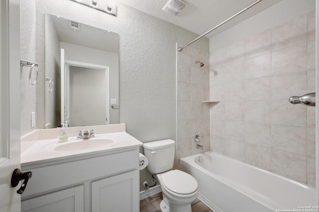 810 Brown Thrasher, San Antonio, TX 78253 - full bathroom featuring a textured wall, toilet, vanity, shower / tub combination, and a textured ceiling