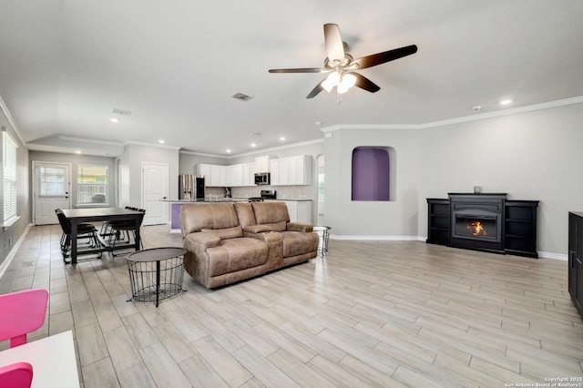 810 Brown Thrasher, San Antonio, TX 78253 - living area featuring ceiling fan, baseboards, recessed lighting, light wood-type flooring, and ornamental molding