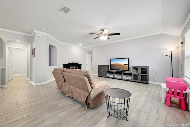 810 Brown Thrasher, San Antonio, TX 78253 - living area with arched walkways, a ceiling fan, baseboards, light wood-style floors, and ornamental molding