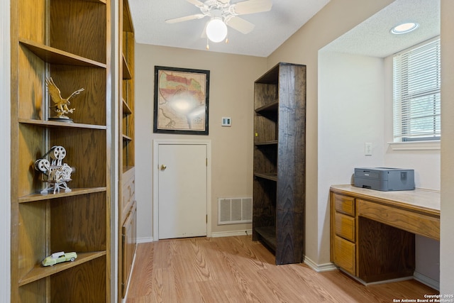 8735 Paseo Oaks, San Antonio, TX 78255 - office with light wood finished floors, a ceiling fan, and baseboards