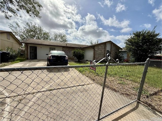 9010 Bowline, San Antonio, TX 78242 - view of front of house with brick siding and concrete driveway