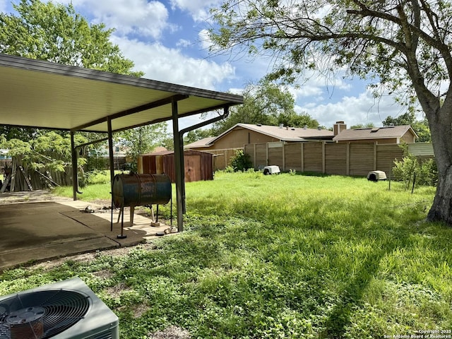 9010 Bowline, San Antonio, TX 78242 - fenced backyard with a patio area, oil tank, and central AC unit