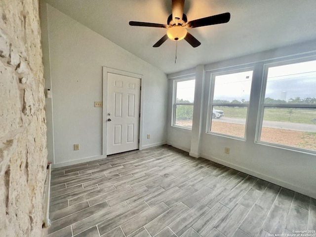 415 Fort Clark Rd Unit 21, Brackettville, TX 78832 - empty room featuring wood finished floors, lofted ceiling, ceiling fan, and baseboards