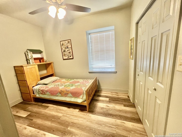 415 Fort Clark Rd Unit 21, Brackettville, TX 78832 - bedroom featuring a closet, light wood-type flooring, a ceiling fan, and baseboards