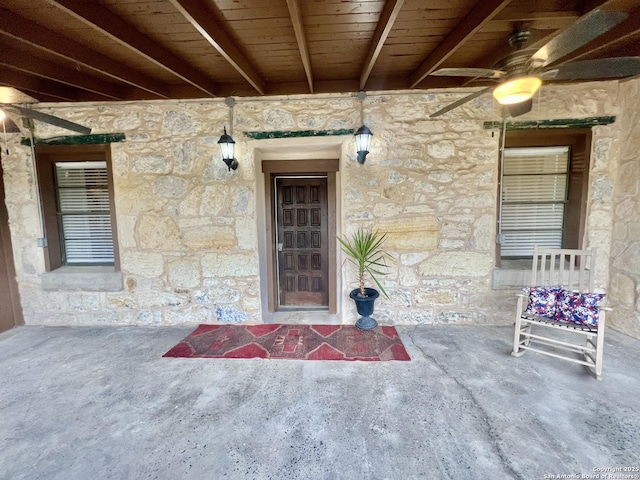 415 Fort Clark Rd Unit 21, Brackettville, TX 78832 - doorway to property featuring stone siding and a ceiling fan