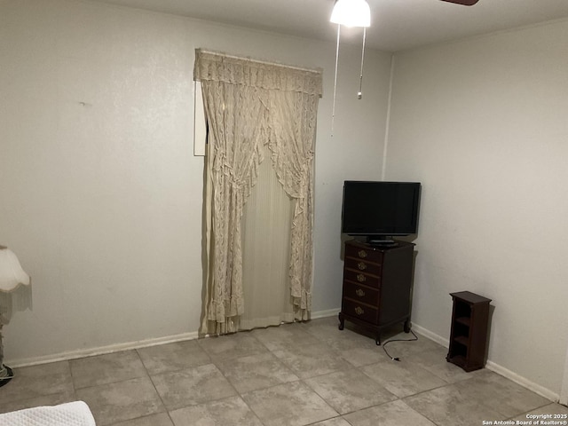 2918 Hatton, San Antonio, TX 78237 - tiled bedroom featuring baseboards and a ceiling fan