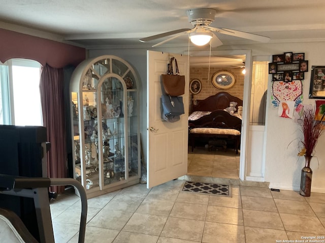 2918 Hatton, San Antonio, TX 78237 - entryway with ceiling fan and light tile patterned floors