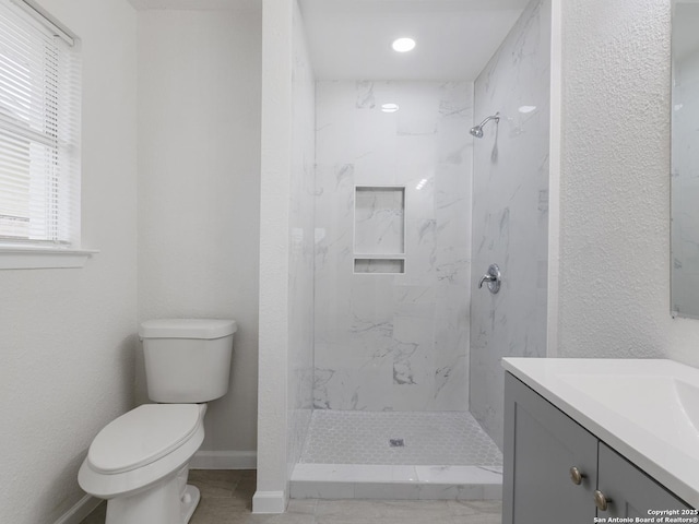 13306 Chesterton, San Antonio, TX 78217 - bathroom featuring vanity, a marble finish shower, and recessed lighting