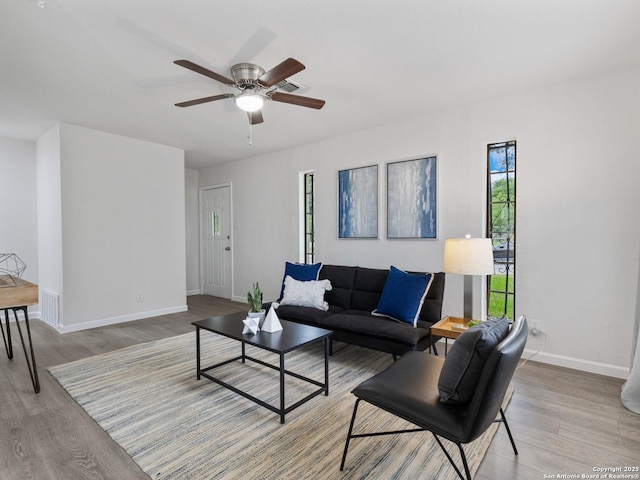 13306 Chesterton, San Antonio, TX 78217 - living room featuring light wood-style flooring and ceiling fan