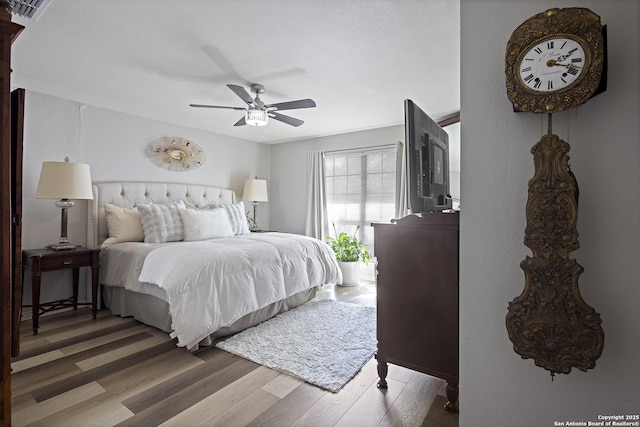 3105 Pecan Valley Dr, Temple, TX 76502 - bedroom with light wood-style flooring and ceiling fan