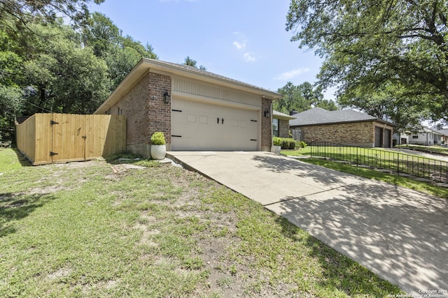 3105 Pecan Valley Dr, Temple, TX 76502 - view of front facade featuring brick siding, concrete driveway, a garage, and a gate