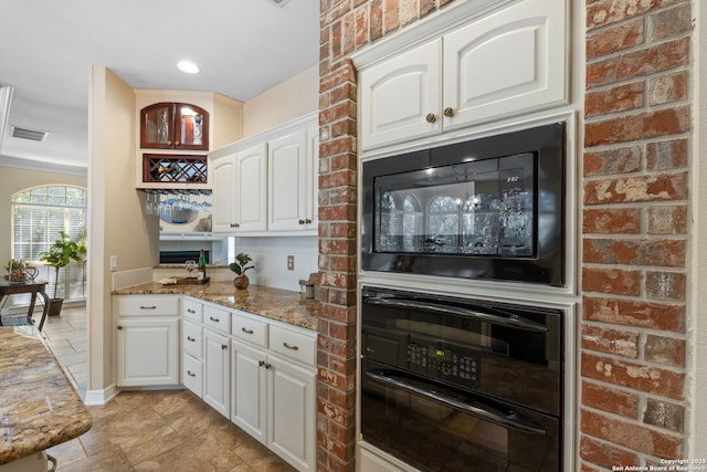 18203 Newcliff, San Antonio, TX 78259 - bar area with black appliances and baseboards