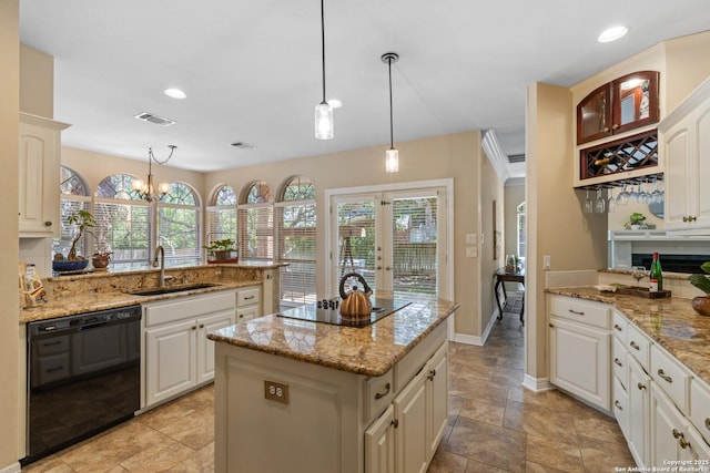 18203 Newcliff, San Antonio, TX 78259 - kitchen featuring black appliances, a sink, a center island, hanging light fixtures, and recessed lighting