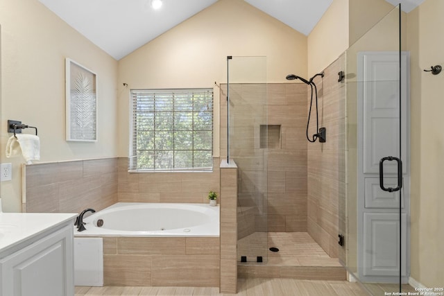 18203 Newcliff, San Antonio, TX 78259 - full bathroom with a shower stall, a whirlpool tub, vanity, and vaulted ceiling
