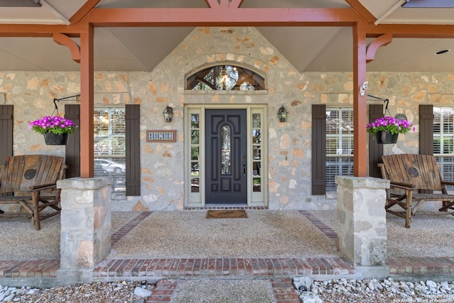18203 Newcliff, San Antonio, TX 78259 - view of exterior entry featuring stone siding and covered porch
