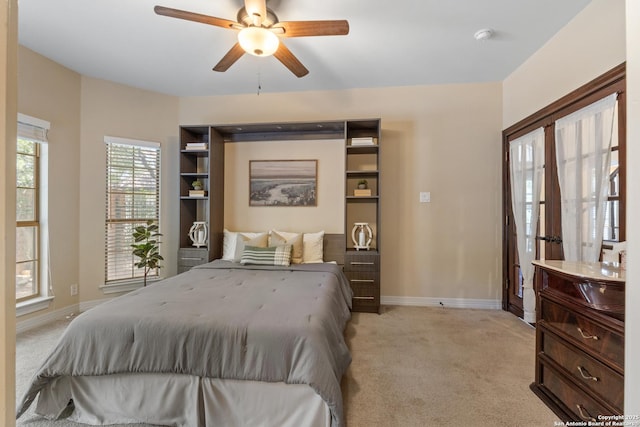 18203 Newcliff, San Antonio, TX 78259 - bedroom featuring light carpet, baseboards, and ceiling fan
