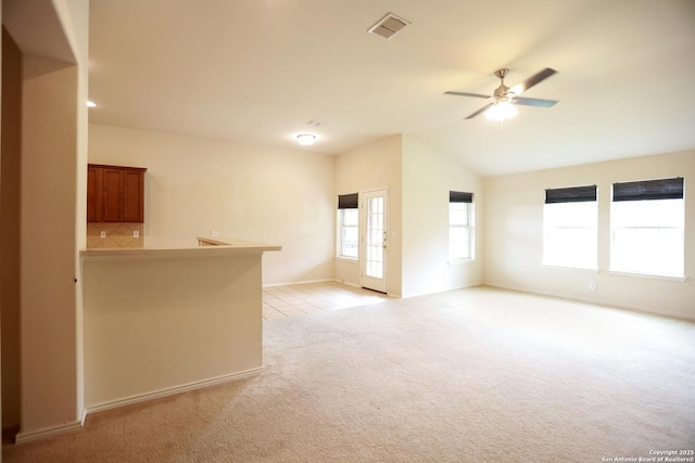 13904 Bressani Way, Live Oak, TX 78233 - spare room with light colored carpet, vaulted ceiling, ceiling fan, and baseboards