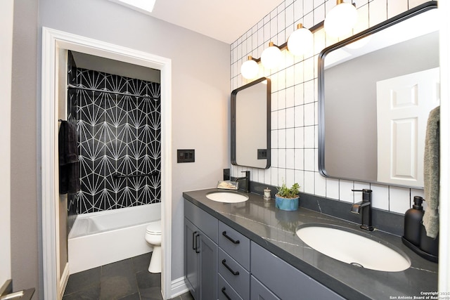 3470 River Path, San Antonio, TX 78230 - bathroom featuring double vanity, toilet, washtub / shower combination, and tasteful backsplash