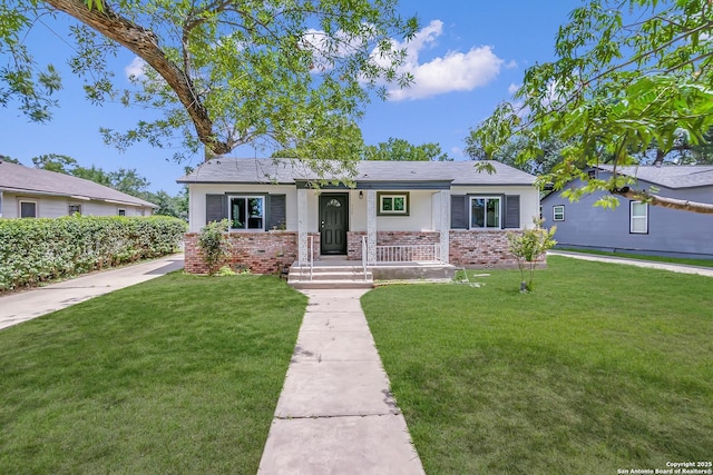 339 Thorain Blvd, San Antonio, TX 78212 - view of front of property with a front yard and brick siding