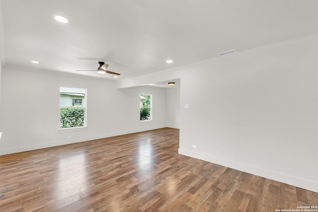 339 Thorain Blvd, San Antonio, TX 78212 - spare room featuring crown molding, baseboards, ceiling fan, wood finished floors, and recessed lighting