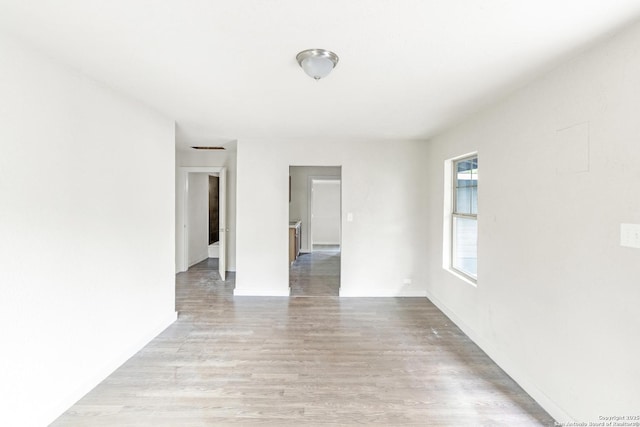 2338 Burnet, San Antonio, TX 78202 - unfurnished room with light wood-type flooring and baseboards