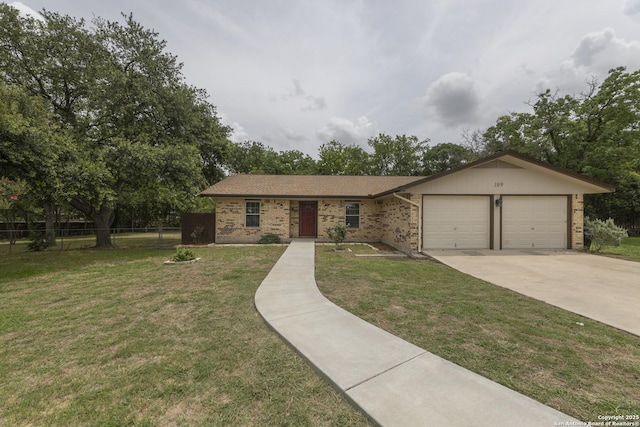 109 Sumac, New Braunfels, TX 78130 - single story home with an attached garage, brick siding, and driveway