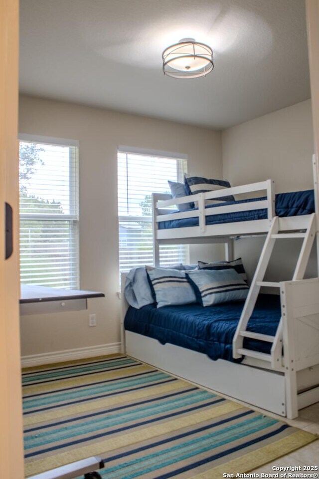2073 Robin Hood, Canyon Lake, TX 78133 - bedroom featuring baseboards