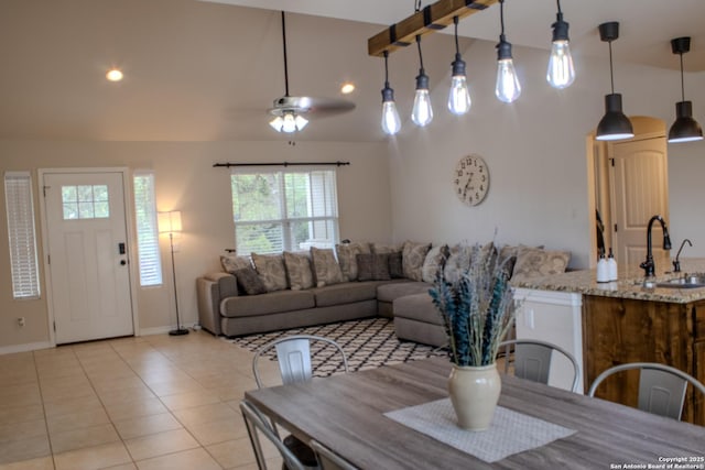 2073 Robin Hood, Canyon Lake, TX 78133 - living room featuring ceiling fan, light tile patterned flooring, baseboards, vaulted ceiling, and recessed lighting