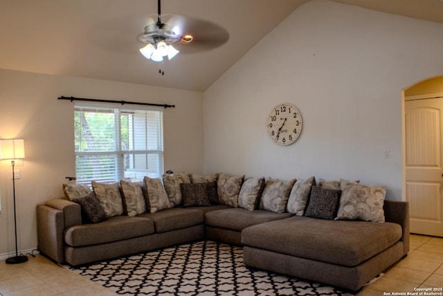 2073 Robin Hood, Canyon Lake, TX 78133 - living room with light tile patterned floors, a ceiling fan, arched walkways, and high vaulted ceiling