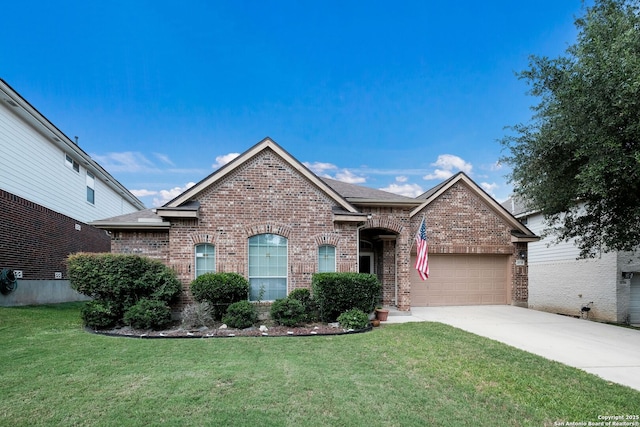 20710 Meandering Cir, San Antonio, TX 78258 - view of front of house featuring brick siding, a garage, concrete driveway, a front yard, and a shingled roof