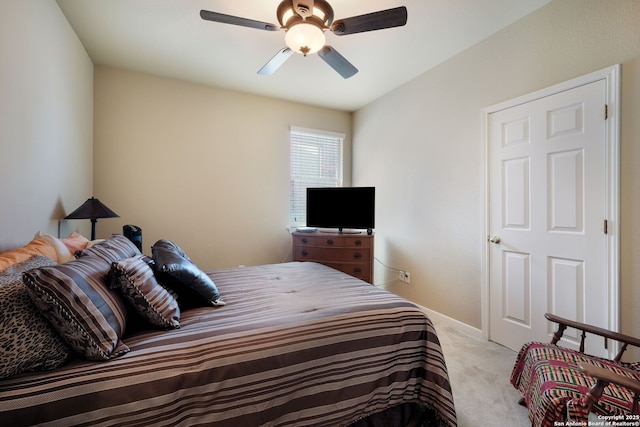 20710 Meandering Cir, San Antonio, TX 78258 - bedroom featuring light carpet, ceiling fan, and baseboards