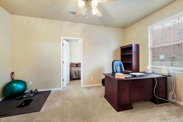20710 Meandering Cir, San Antonio, TX 78258 - office area featuring a ceiling fan, light colored carpet, and baseboards