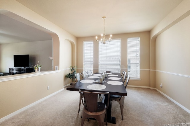 20710 Meandering Cir, San Antonio, TX 78258 - dining space featuring carpet flooring, a chandelier, baseboards, and plenty of natural light