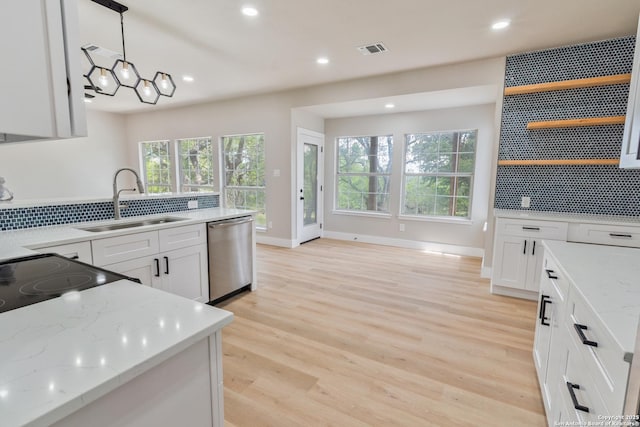 907 Amigo, San Antonio, TX 78260 - kitchen with dishwasher, open shelves, a sink, tasteful backsplash, and light wood-style flooring