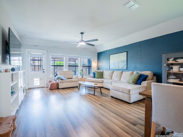10760 Rosalina Loop, Converse, TX 78109 - living area with wood finished floors and a ceiling fan