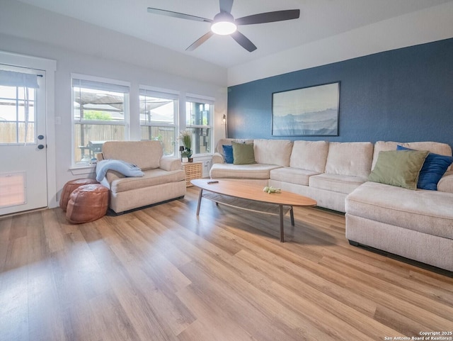 10760 Rosalina Loop, Converse, TX 78109 - living area featuring wood finished floors and ceiling fan