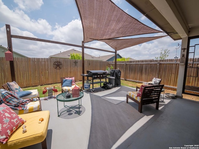 10760 Rosalina Loop, Converse, TX 78109 - fenced backyard featuring a patio area and an outdoor living space