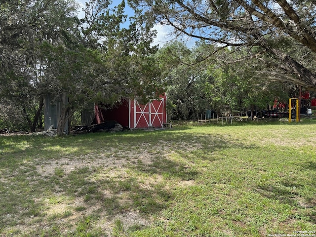 952 Madrona Rd, Pipe Creek, TX 78063 - view of grassy yard featuring an outdoor structure