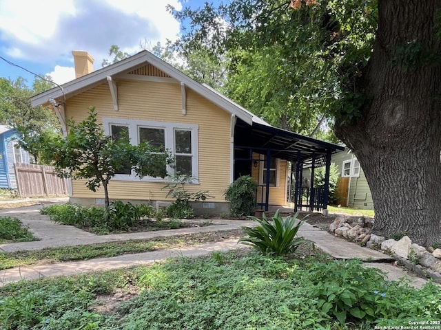 519 Huisache, San Antonio, TX 78212 - view of front facade with crawl space and a chimney