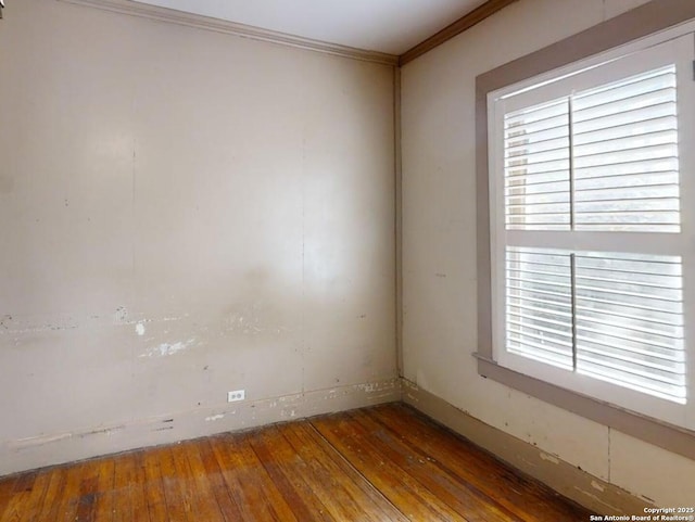 519 Huisache, San Antonio, TX 78212 - unfurnished room featuring hardwood / wood-style floors, crown molding, plenty of natural light, and baseboards