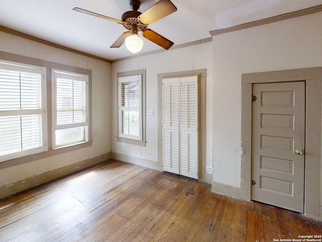 519 Huisache, San Antonio, TX 78212 - unfurnished room with wood-type flooring, crown molding, a ceiling fan, and baseboards